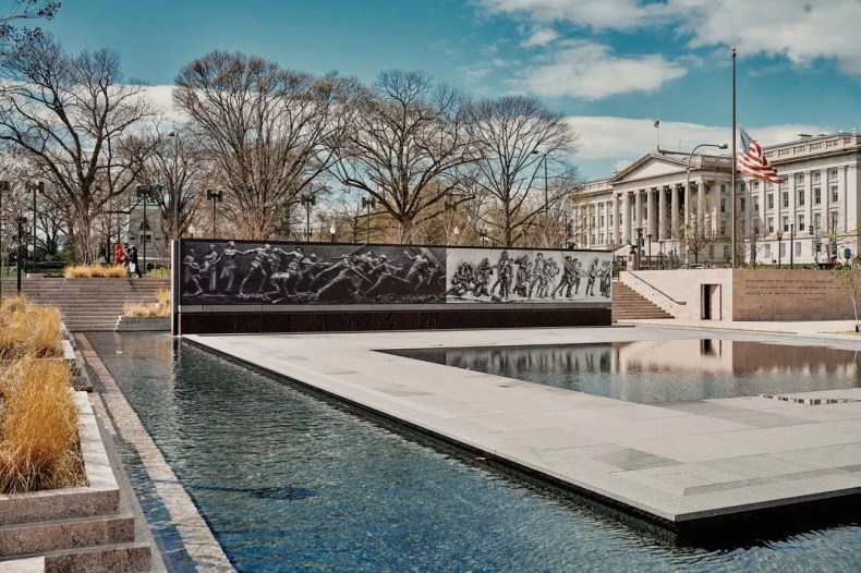 a fountain in a city park